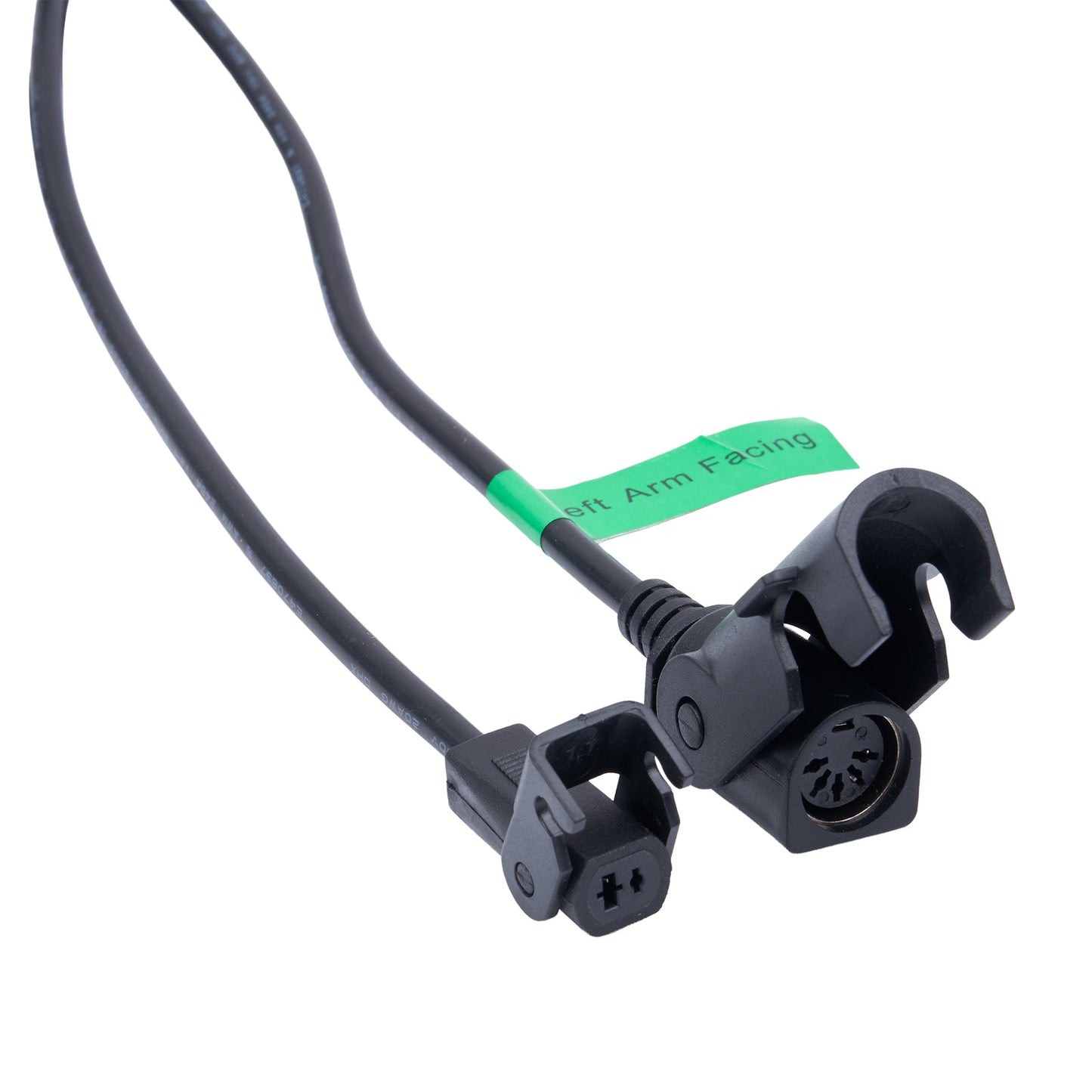 Black sensor cable with green label on a white background