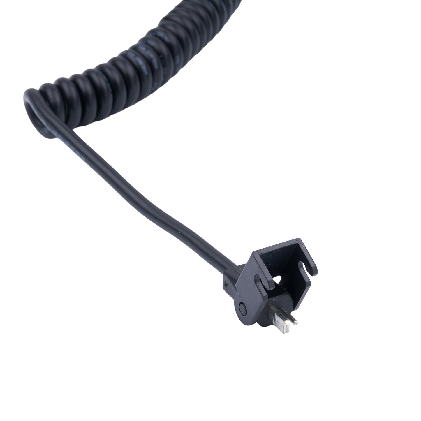 Black coiled cable with a plug on a white background