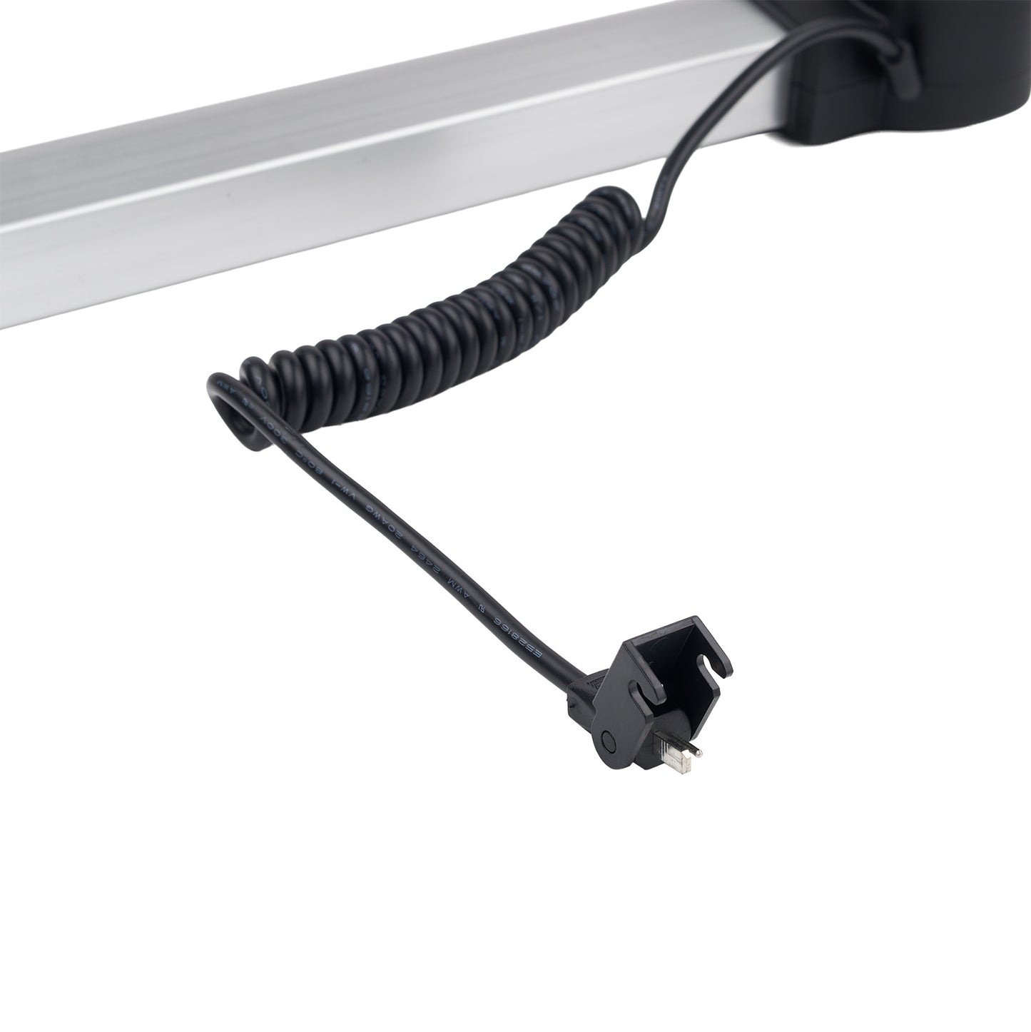 Black coiled cable with a plug on a white background