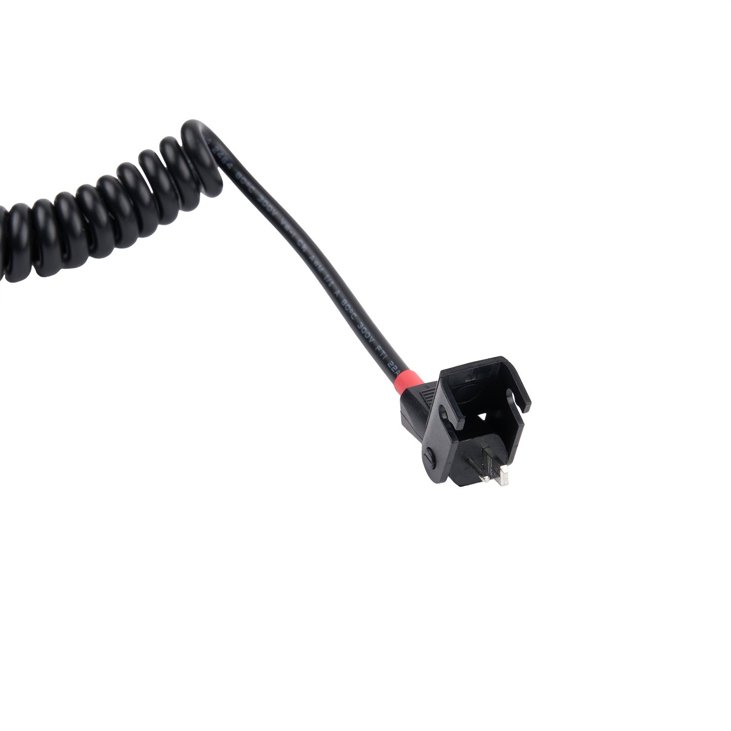 Black coiled cable with a connector on a white background