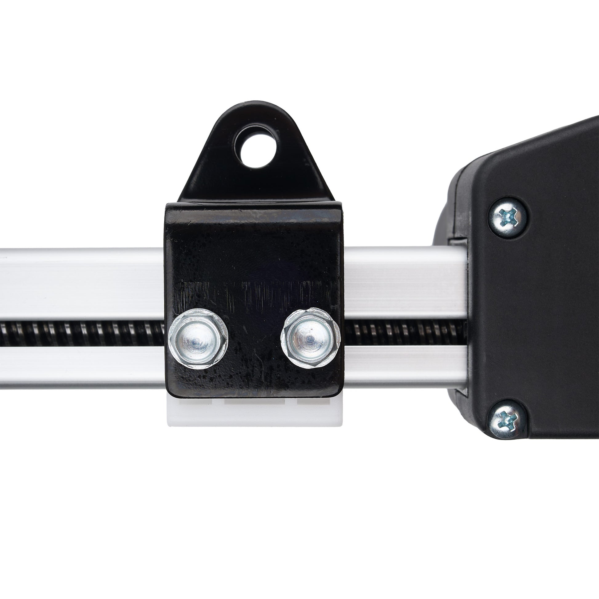 Close-up of a black metal linear rail bracket with two silver screws, attached to a silver aluminum rail, with a black end housing on the right, isolated on a white background.