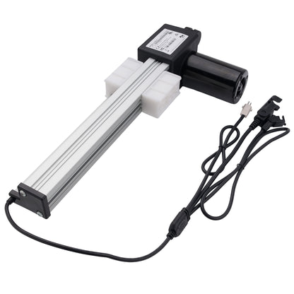 A linear electric motor slide rail assembly with a black cylindrical motor, a silver aluminum rail, white plastic end blocks, and an attached black power cable with a plug on a white background.