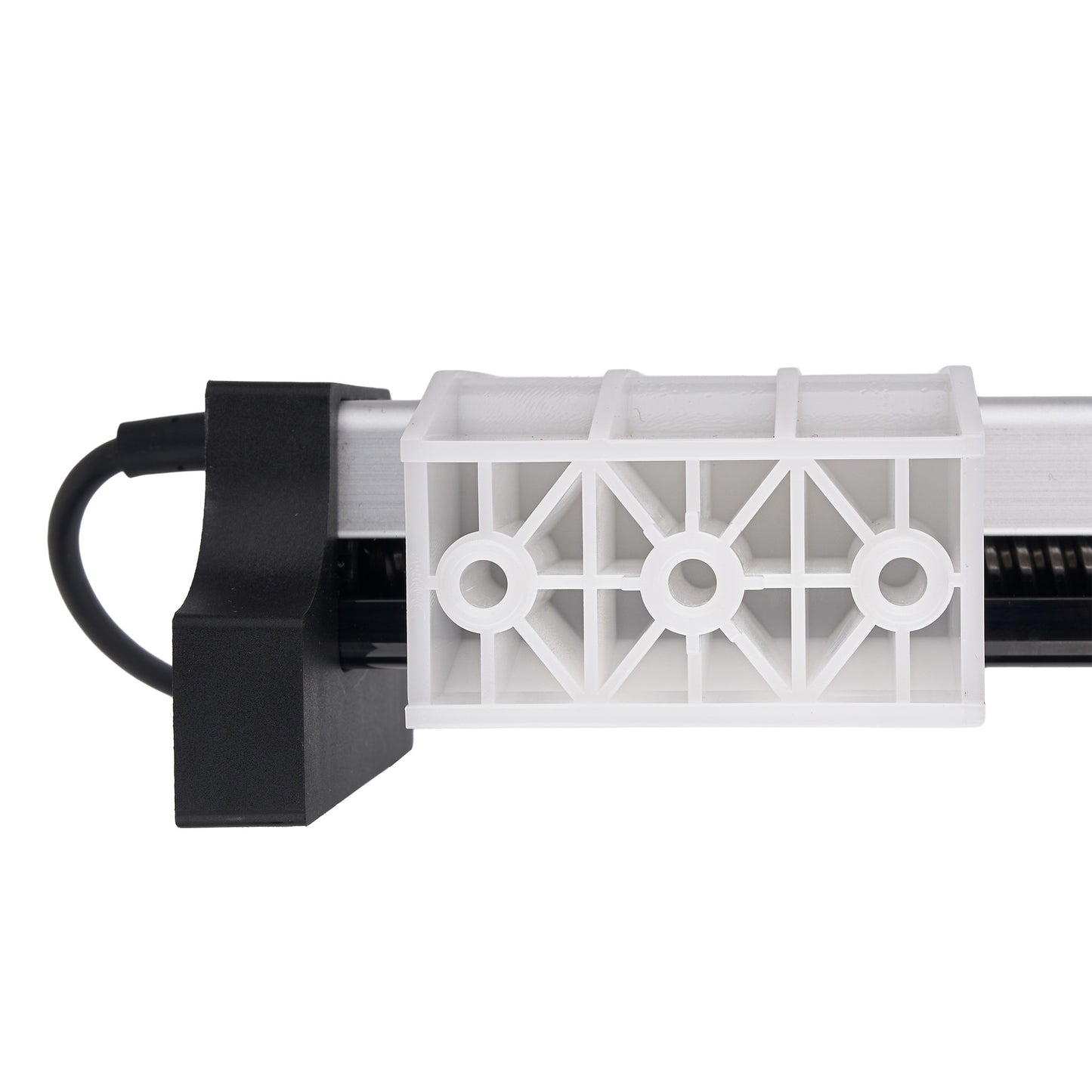 A close-up of a white plastic linear guide rail with a black mounting bracket and cable on a white background.
