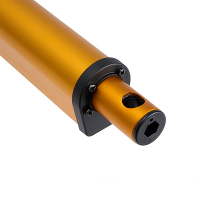 Gold metal rod with black fitting on a white background