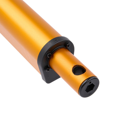 Close-up of an orange metal rod with black components on a white background