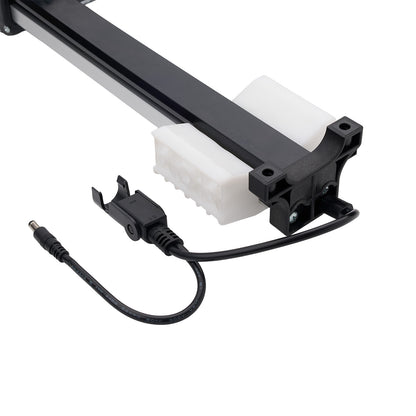 Light fixture with white bulb and black metal casing on a white background