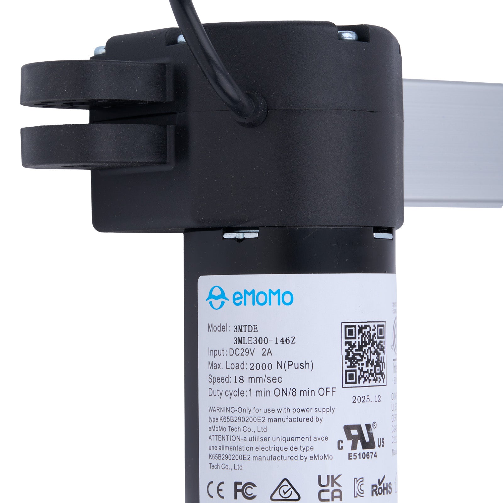 Black electronic component with emomo branding and label on a white background