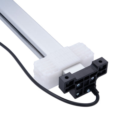 Light fixture with black mounting bracket on a white background