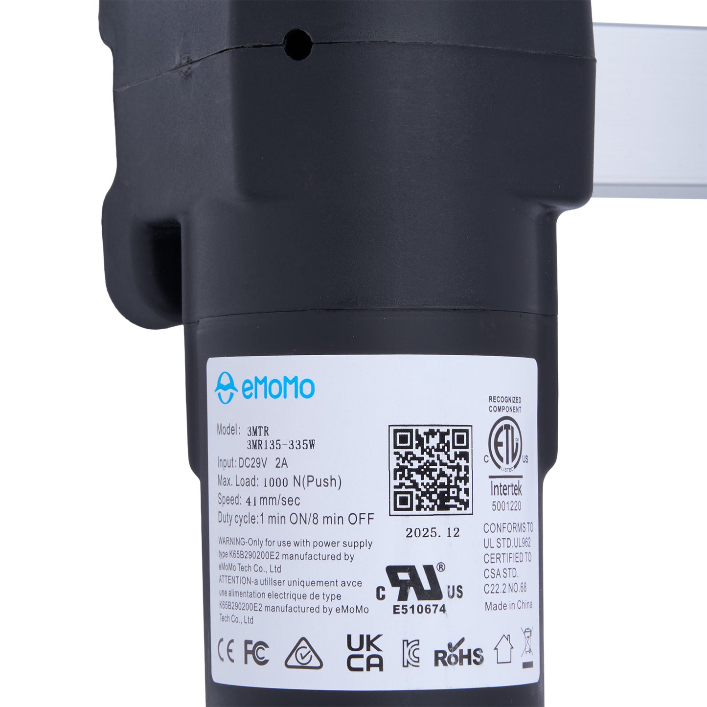 Black mechanical component with emomo label and certification logos on a white background