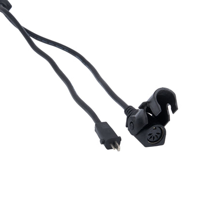 Black electrical cable with plug and socket on a white background