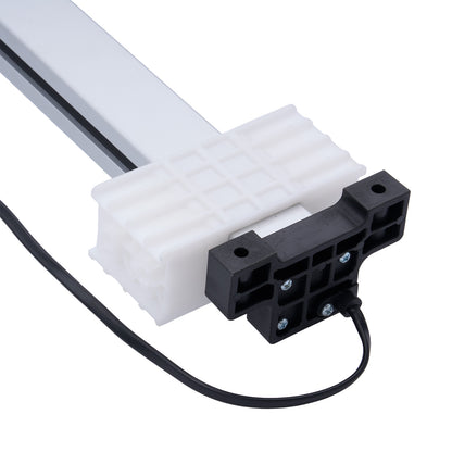 Light fixture with white diffuser and black housing on a white background