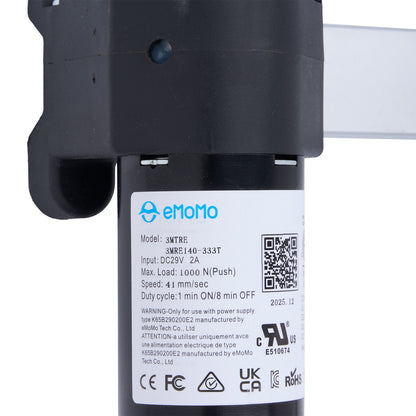 Close-up of a device with emomo branding and technical specifications on a white background