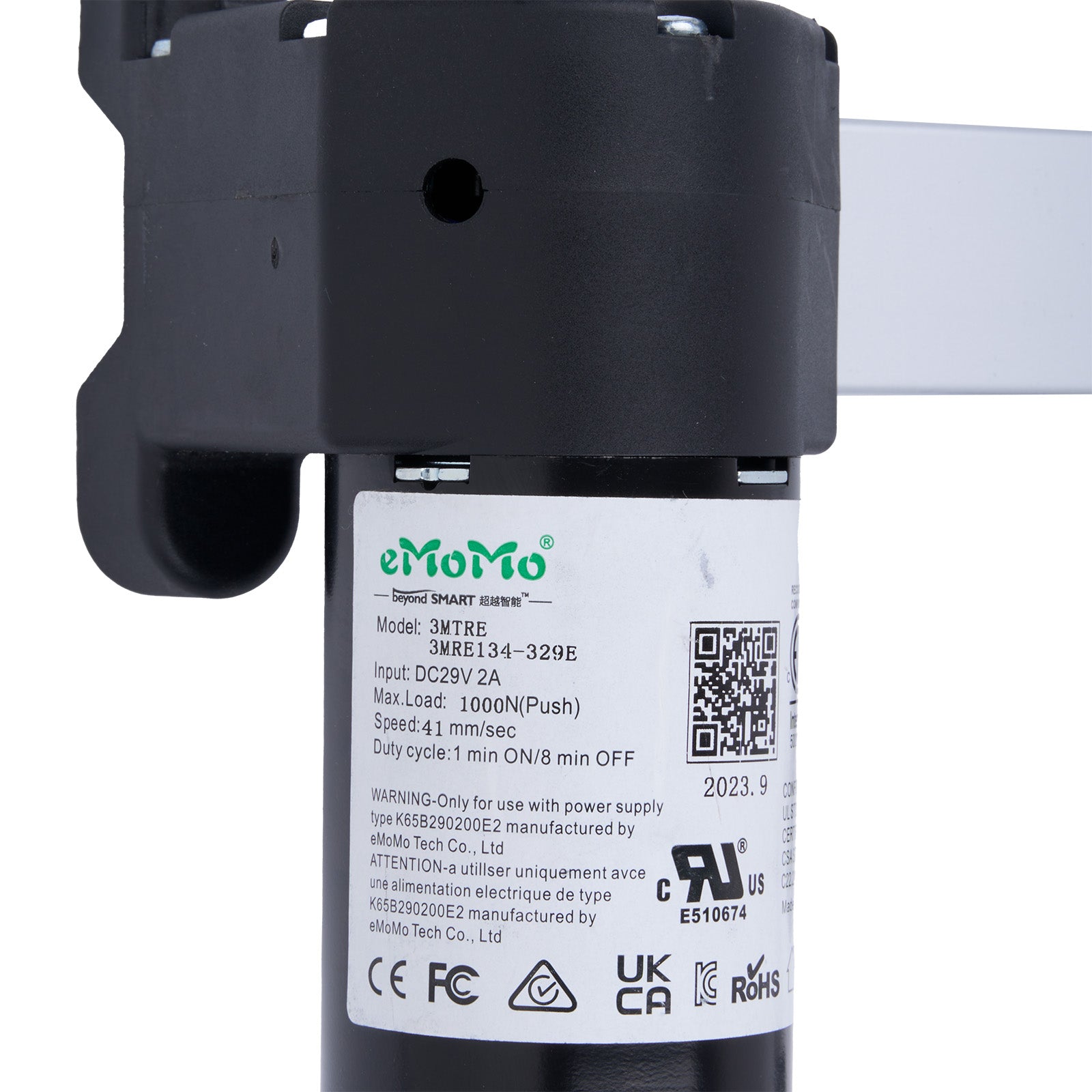 eMoMo smart device with label and certification logos on a white background