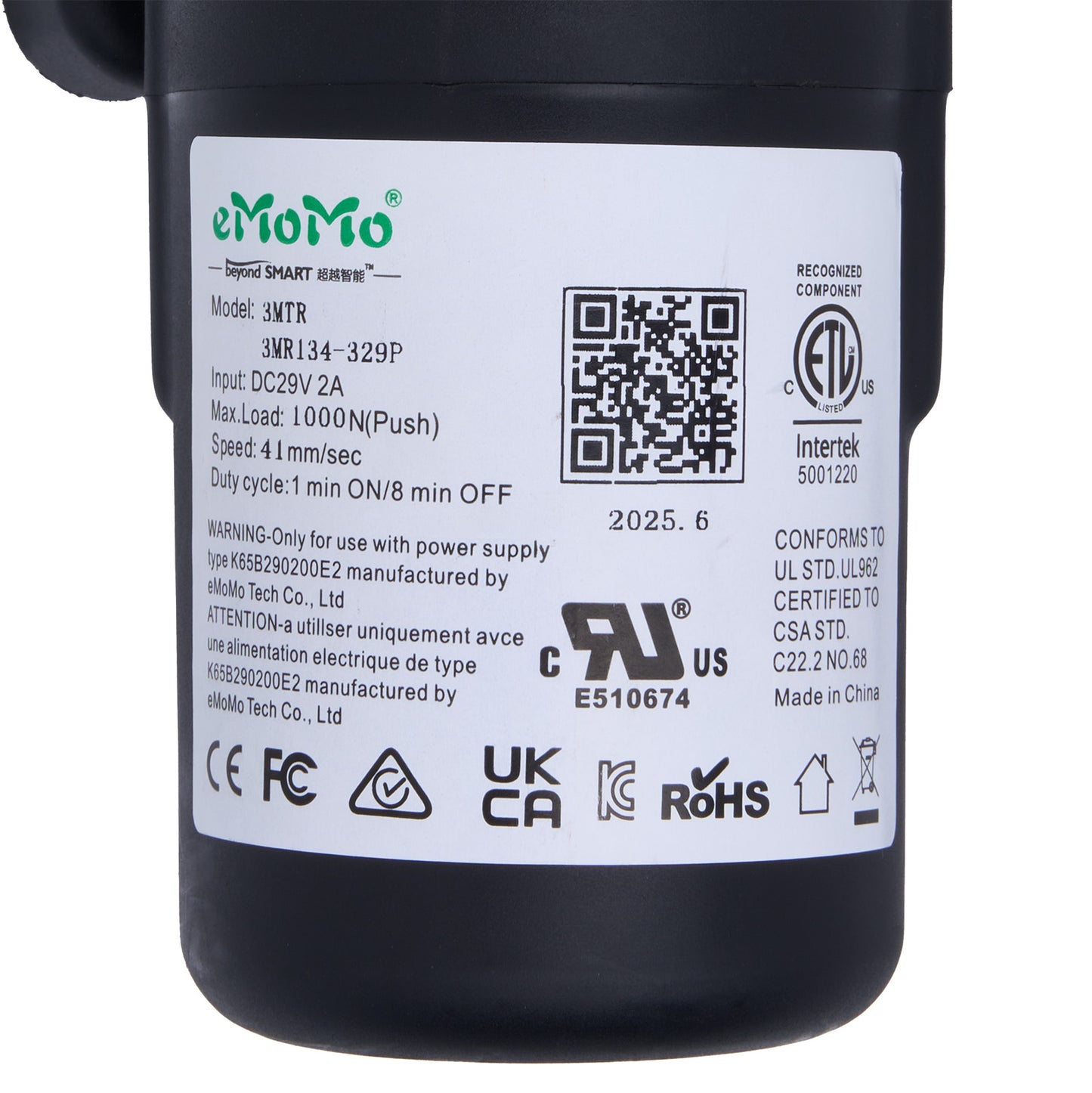 Black device with a label containing text, symbols, and a QR code on a white background