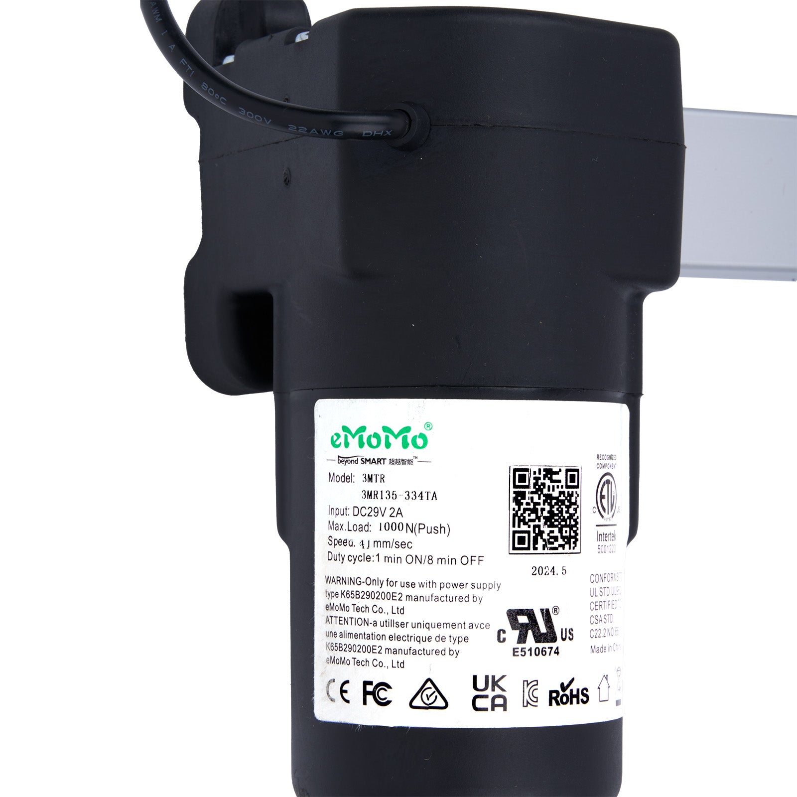 Black electronic device with a label on a white background