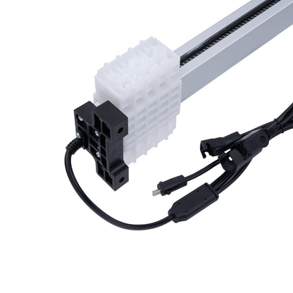 White electronic component with black cables on a white background