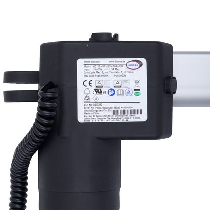 Black motor actuator with a label on a white background