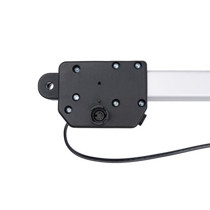 Black mechanical component with a white rod on a white background