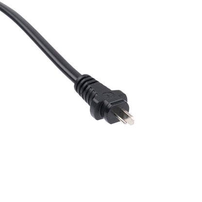 Black electrical plug on a white background