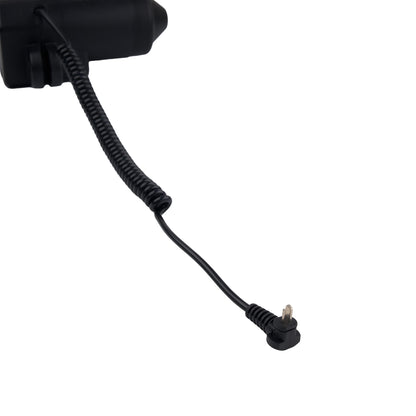 Black coiled cable with a plug on a white background