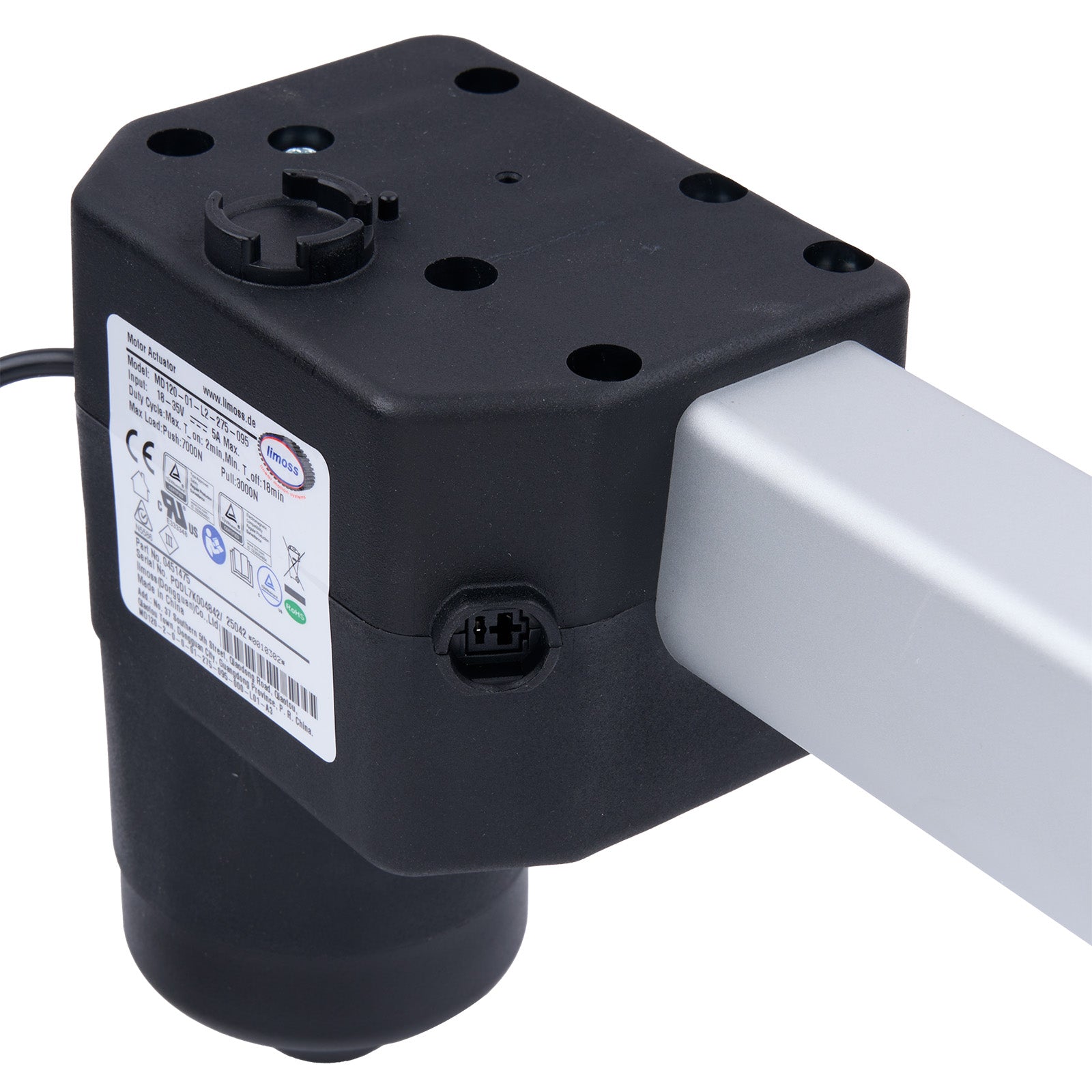 Black mechanical component with white cable on a white background