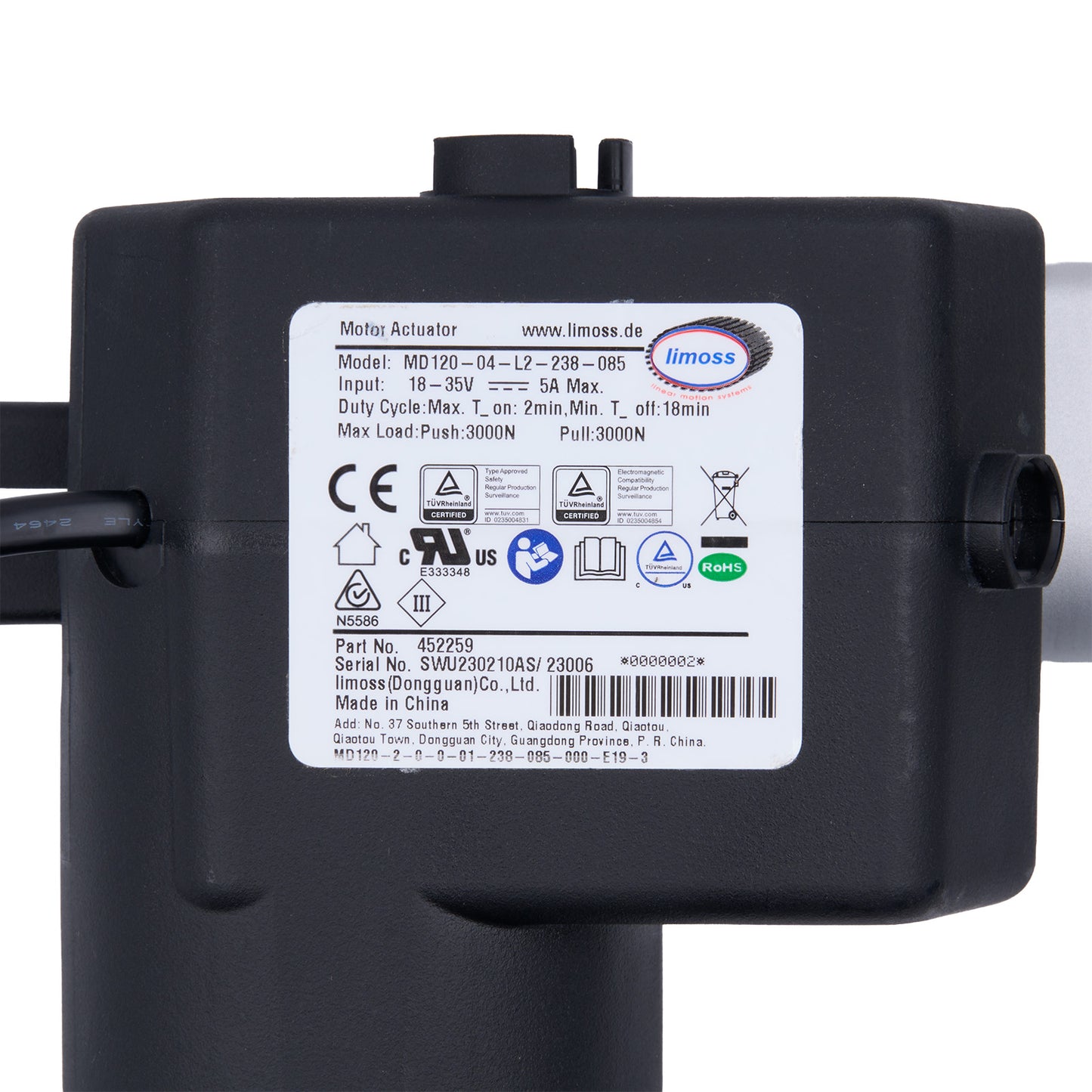 Black actuator with a label on a white background