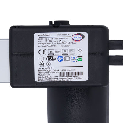 Black motor actuator with label on a white background