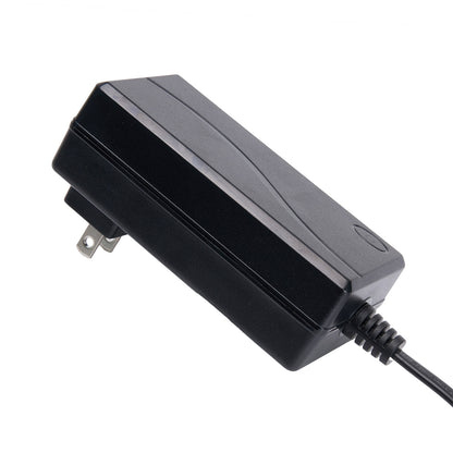 Black power adapter with a plug on a white background