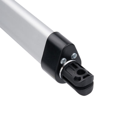 Close-up of a metallic rod with a black connector on a white background