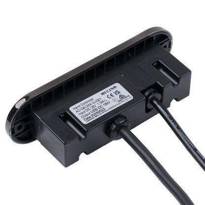 Black electronic component with cables on a white background