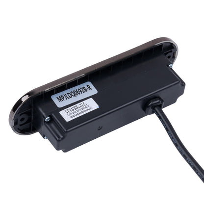 Black electronic component with a label on a white background