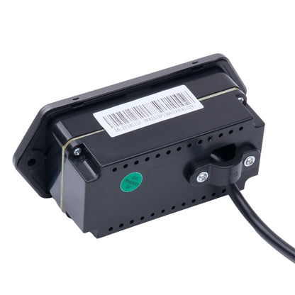 A black electronic control module with a barcode label and a green sticker, shown on a white background with a black cable extending from the side.