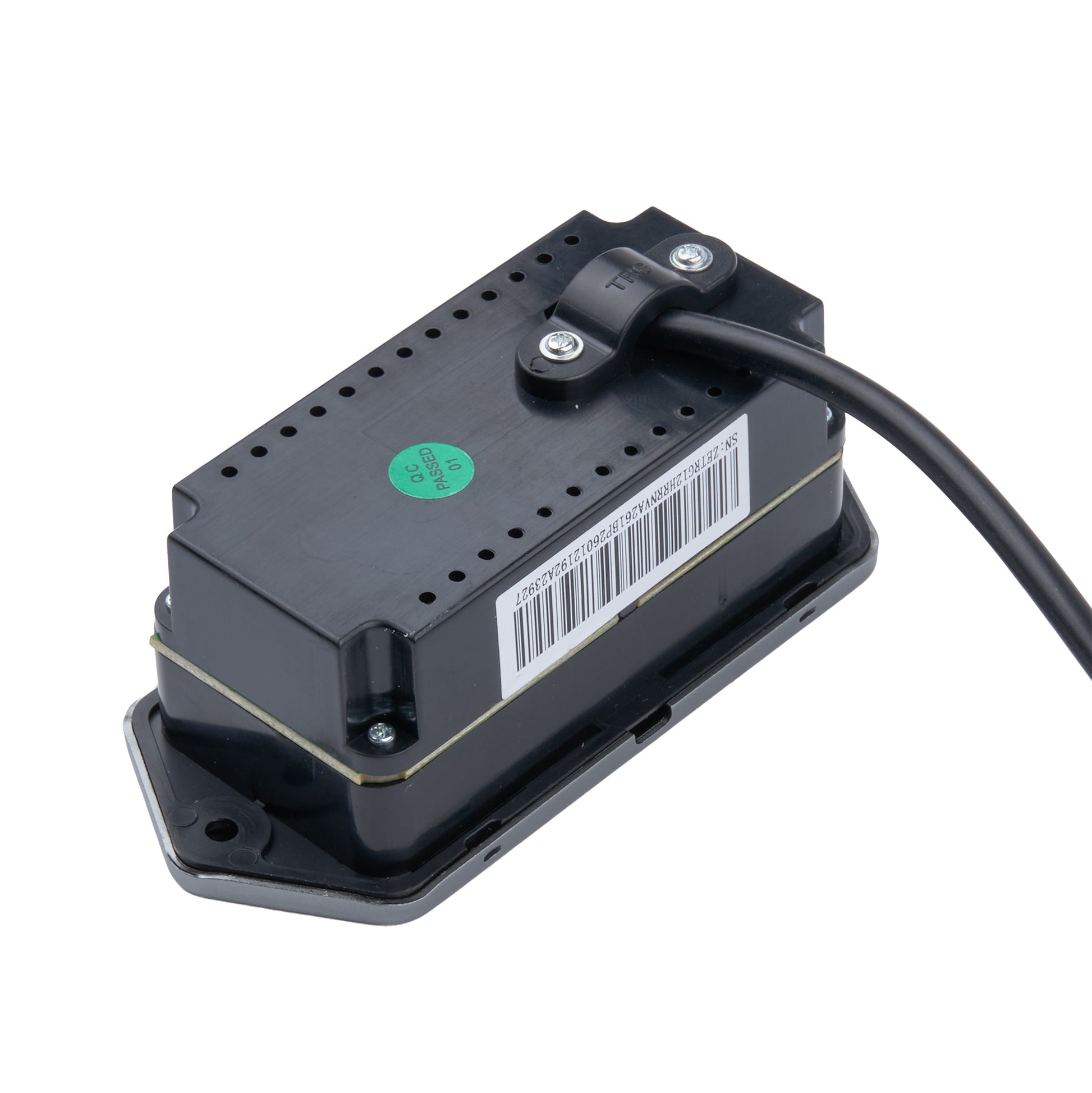 A black electronic control module with a barcode label and a green sticker, shown on a white background with a black cable attached.