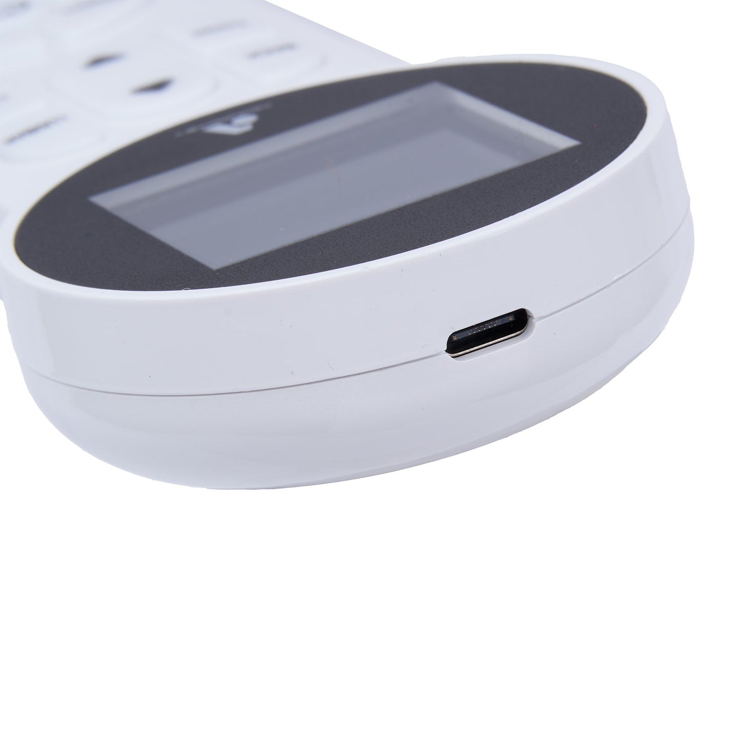 Close-up of a white electronic device with a USB port on a white background