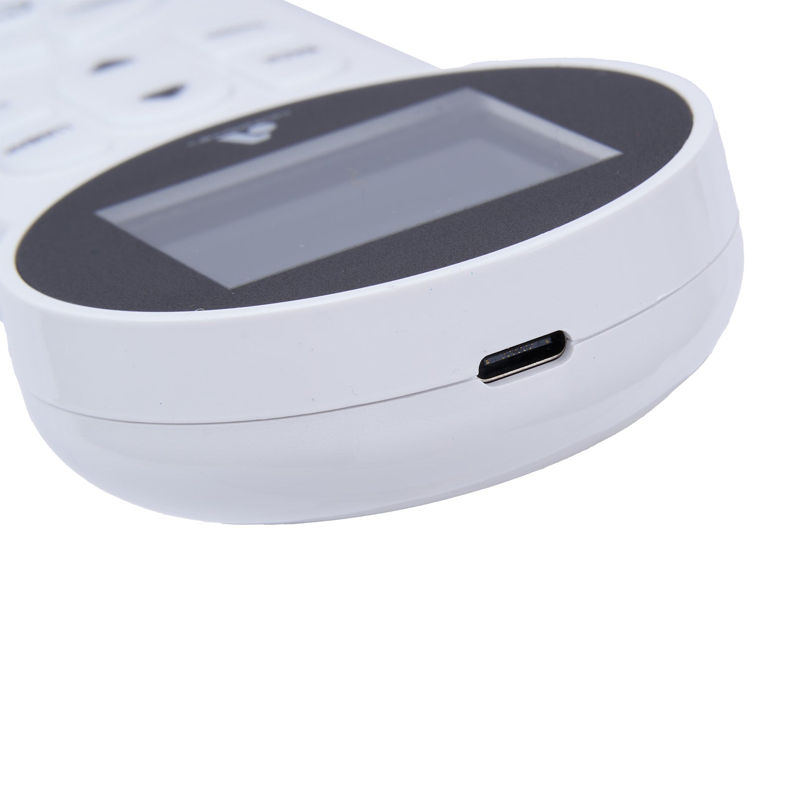 Close-up of a white electronic device with a USB port on a white background