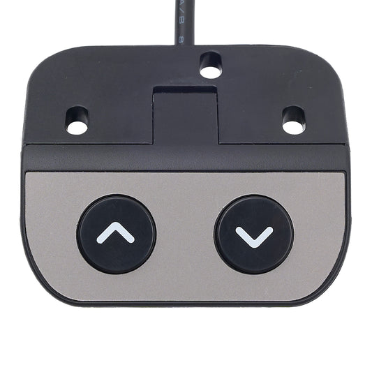 Close-up of a golf putter head with two buttons on a white background