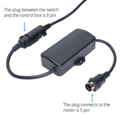 Black control box with wiring and connectors on a white background