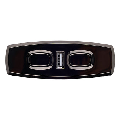 Car grille emblem with a black and chrome finish on a white background