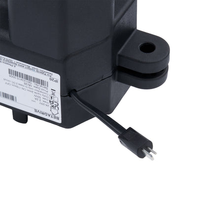Black electrical outlet with plug on a white background