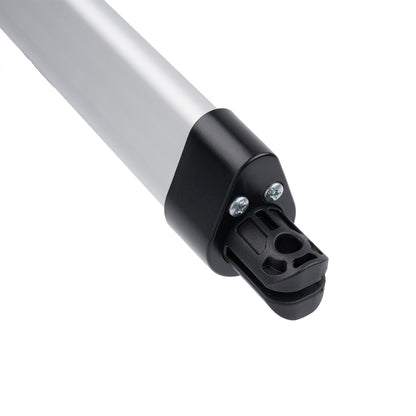 Close-up of a black and white cylindrical object on a white background