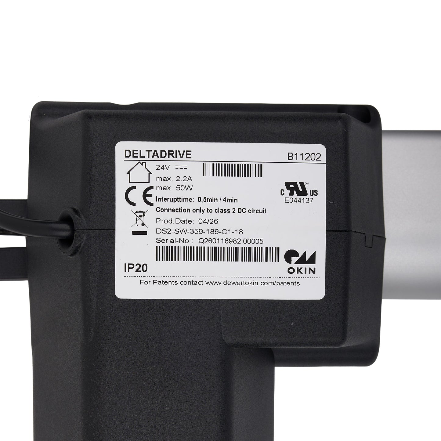 Mechanical component with a white bar and black housing on a white background
