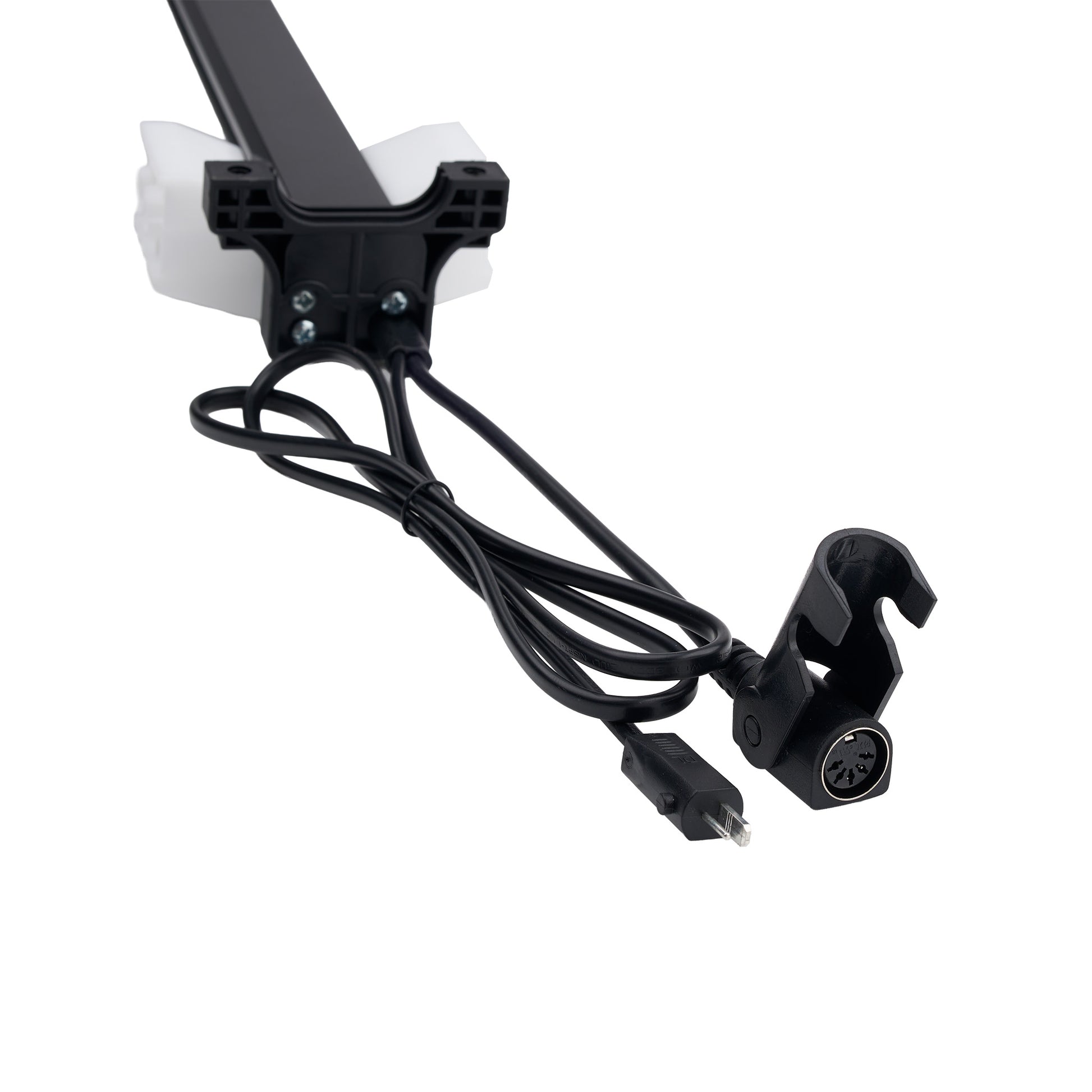 Black electronic component with wires on a white background