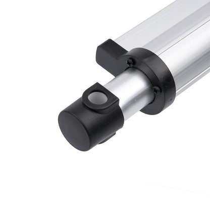 Metallic cylindrical component with black connectors on a white background