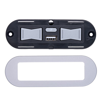 A black plastic dual USB-C charging panel with two silver USB-C connectors and a central power button, shown above a matching silver oval mounting frame on a white background.