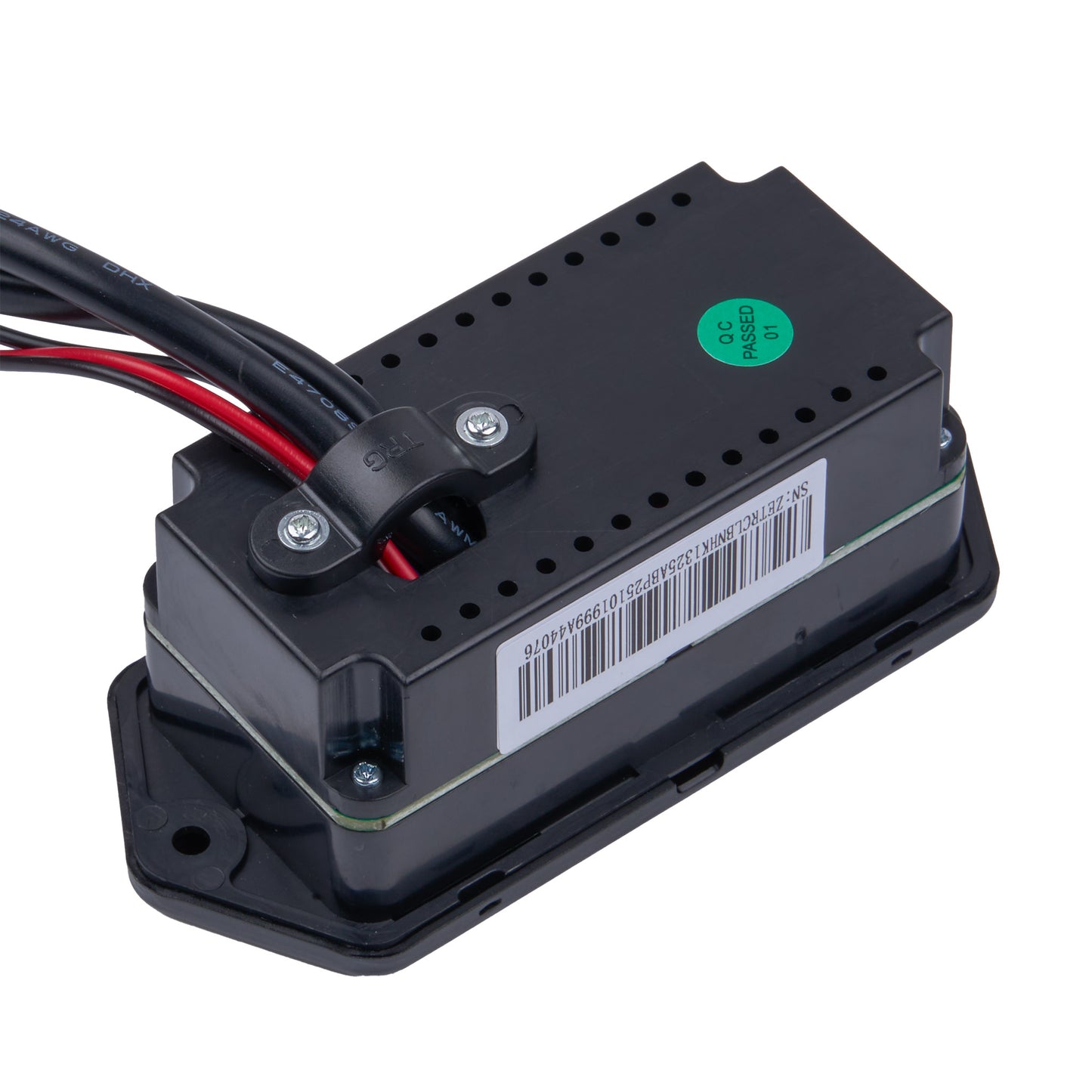 A black electronic control module with attached wires, a barcode label, and a small green sticker, photographed on a plain white background.