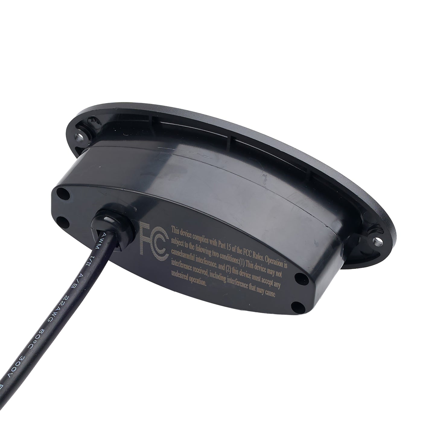 A black plastic automotive radar detector with a cable connector, featuring gold text and a white FCC logo on its side, shown on a white background.