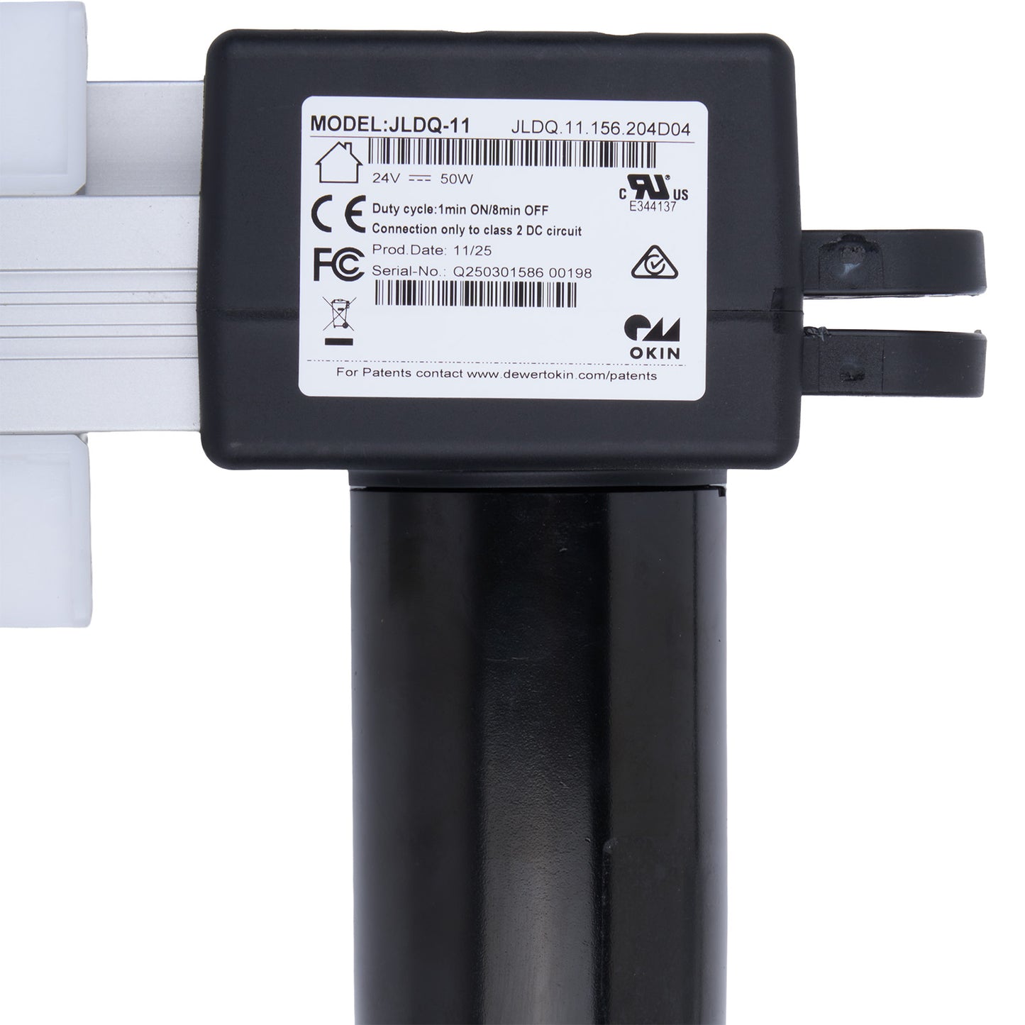 Black electronic component with label on a white background