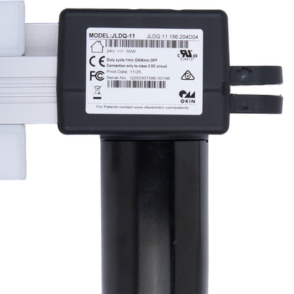 Black electronic component with label on a white background