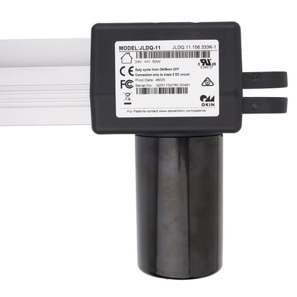 A close-up of a black electrical component with a white label showing model JLDQ-11 and technical details, mounted on a cylindrical base with two black straps extending to the right, against a white background.