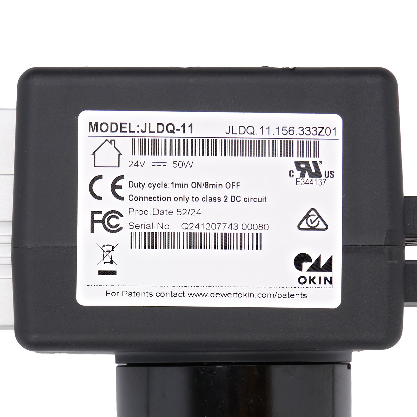 Black electronic device with a label on a white background